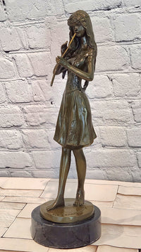 Hand Made Bronze Sculpture of a Young Girl playing the Flute by J. Patoue