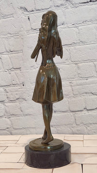 Hand Made Bronze Sculpture of a Young Girl playing the Flute by J. Patoue