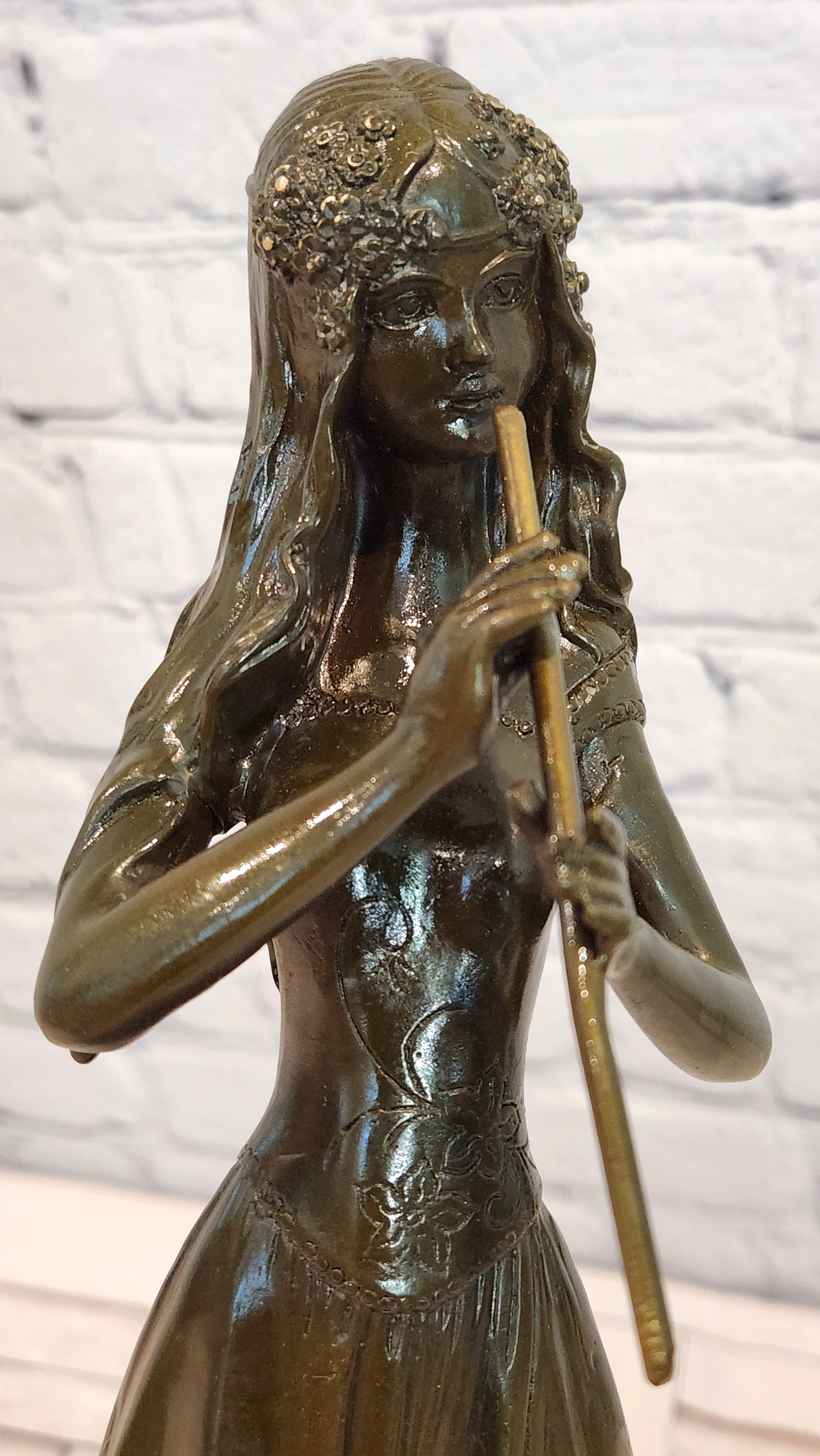 Hand Made Bronze Sculpture of a Young Girl playing the Flute by J. Patoue