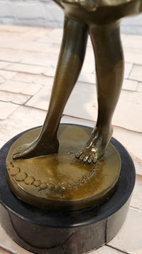 Hand Made Bronze Sculpture of a Young Girl playing the Flute by J. Patoue