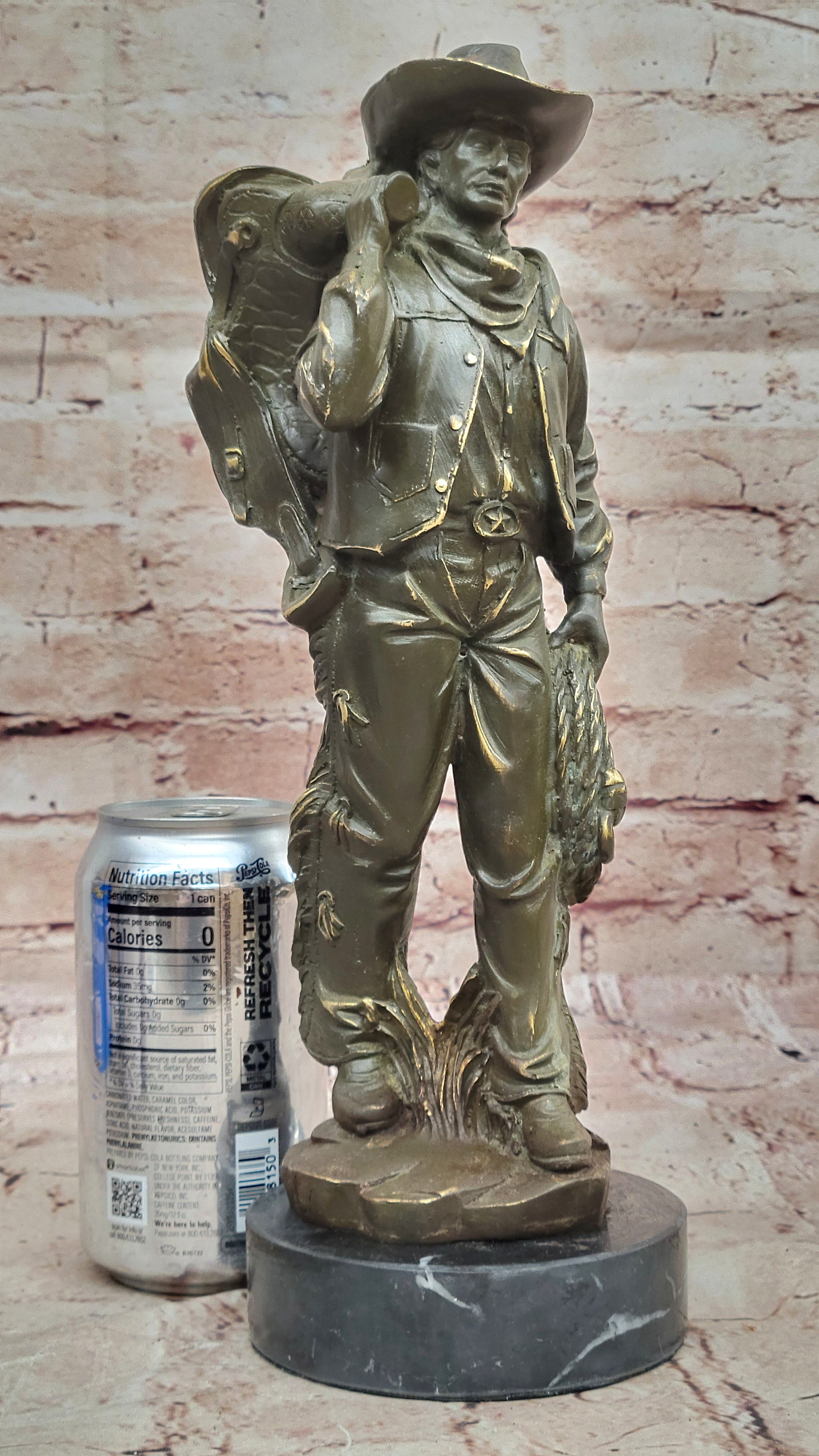 Cowboy with Saddle Bronze Sculpture - Western Art