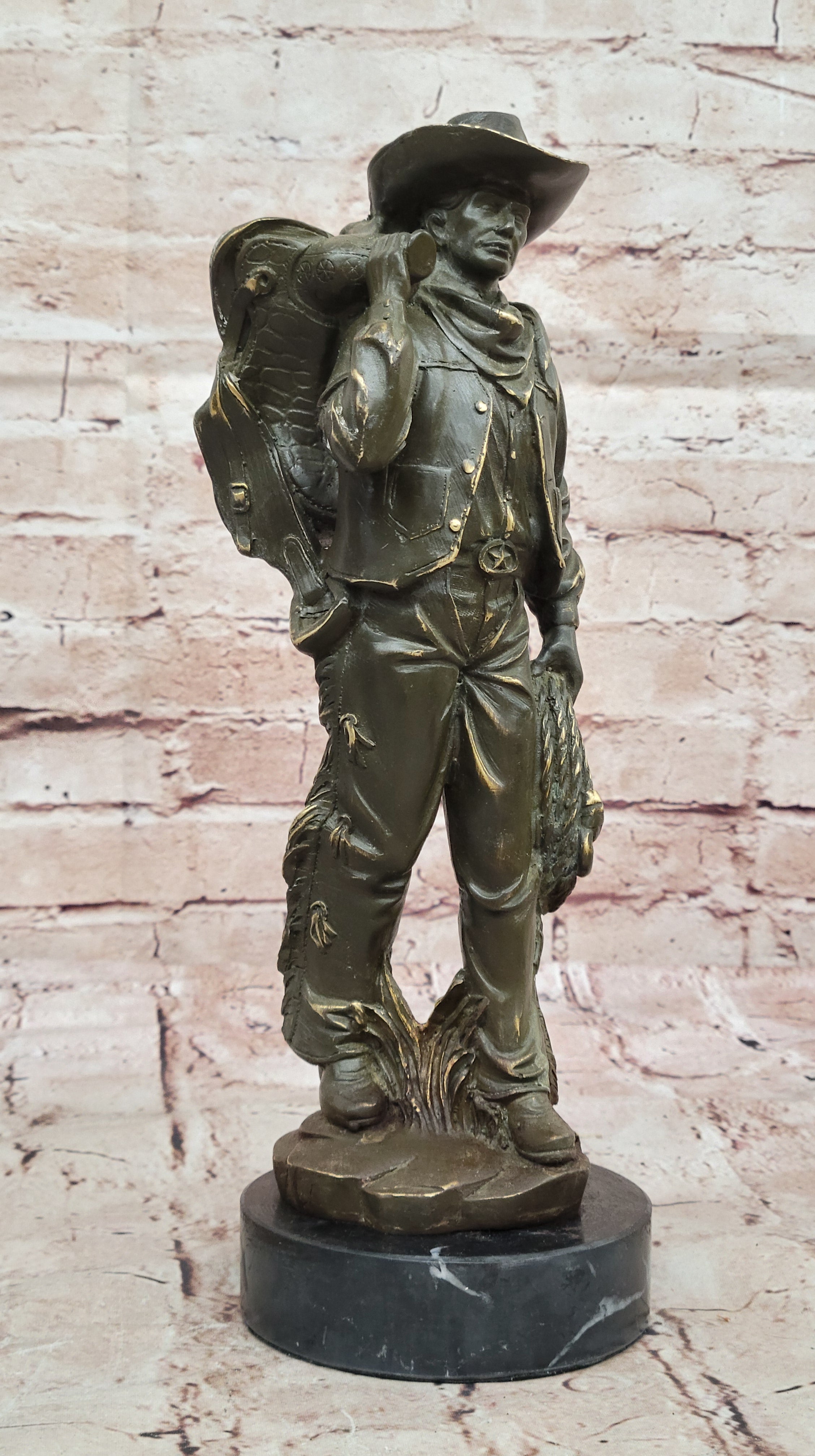 Cowboy with Saddle Bronze Sculpture - Western Art