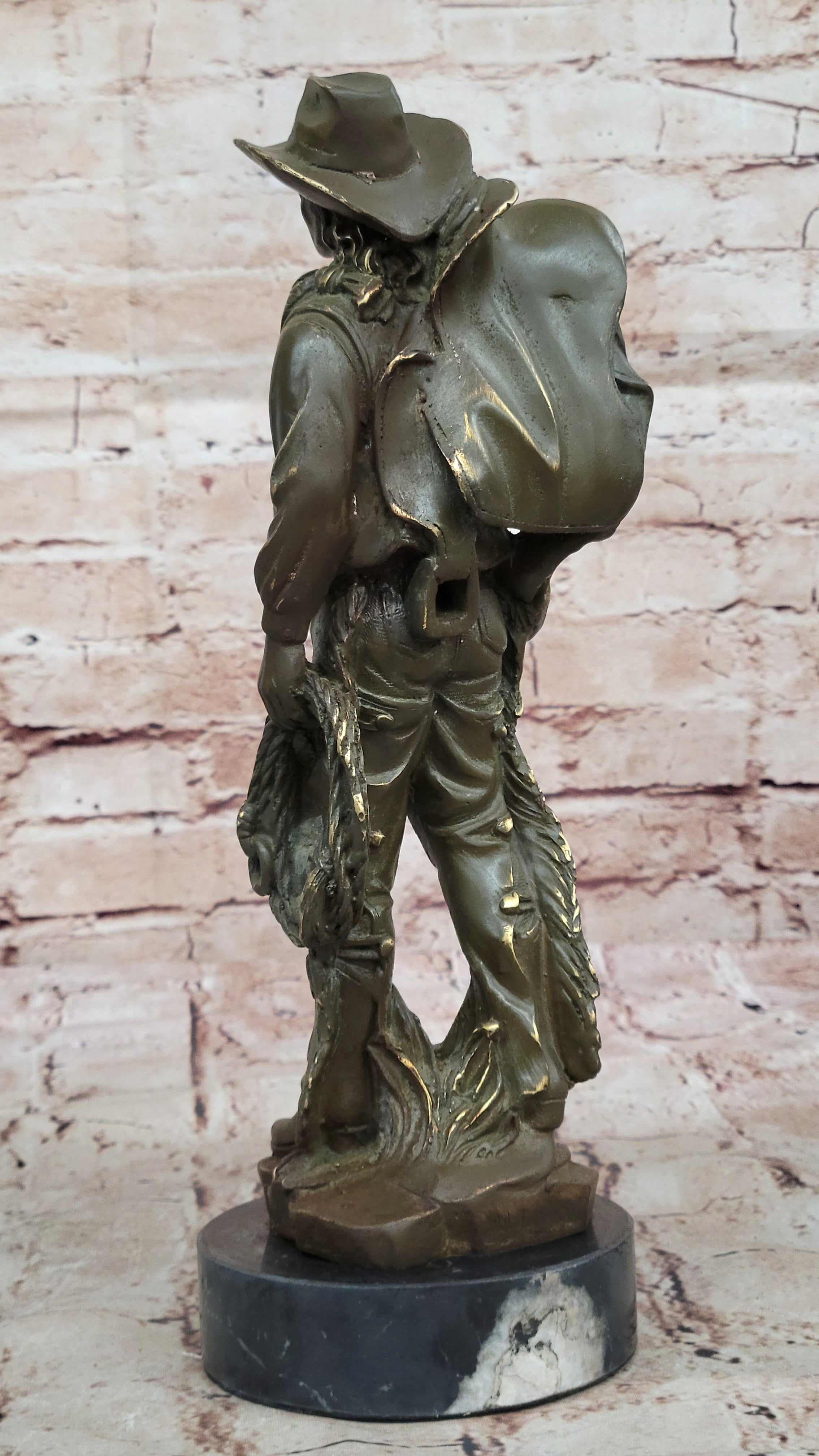 Cowboy with Saddle Bronze Sculpture - Western Art