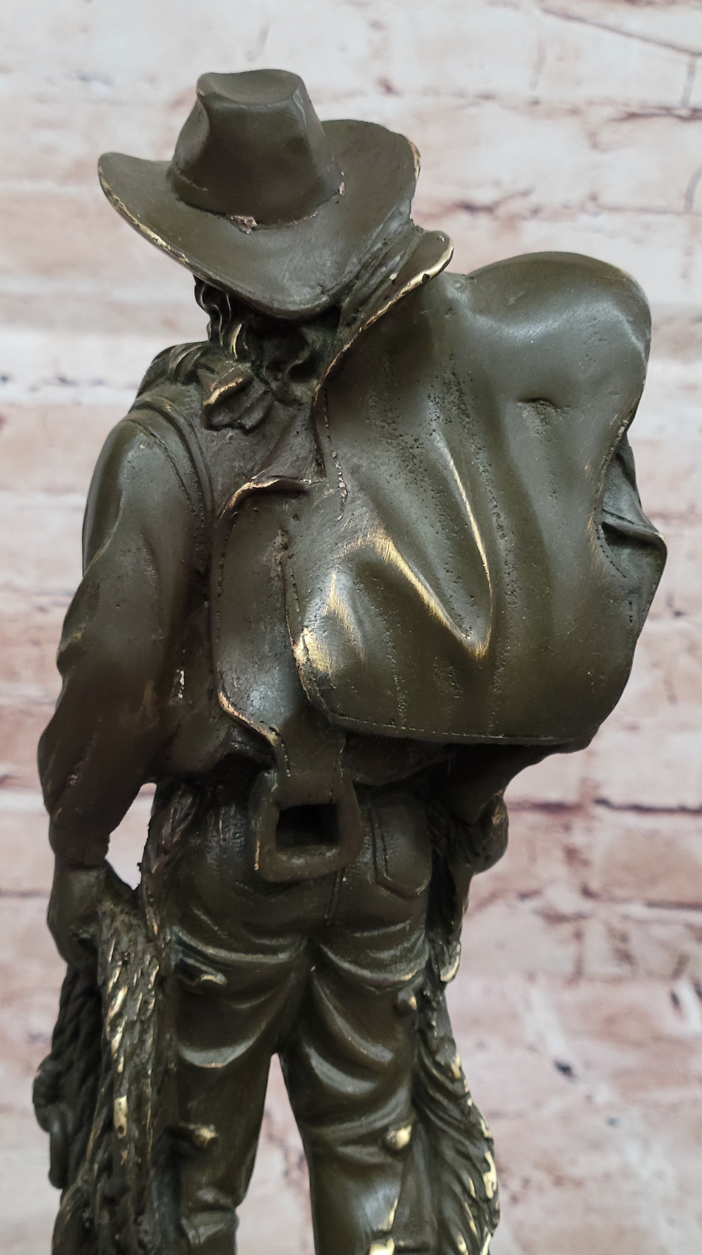 Cowboy with Saddle Bronze Sculpture - Western Art