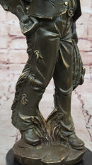 Cowboy with Saddle Bronze Sculpture - Western Art