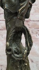 Cowboy with Saddle Bronze Sculpture - Western Art