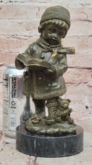 Winter Child Reading Book – Bronze with Teddy Bear