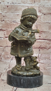 Winter Child Reading Book – Bronze with Teddy Bear