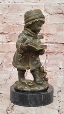Winter Child Reading Book – Bronze with Teddy Bear