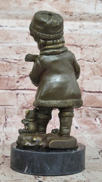 Winter Child Reading Book – Bronze with Teddy Bear