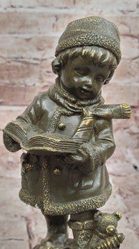 Winter Child Reading Book – Bronze with Teddy Bear