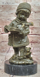 Winter Child Reading Book – Bronze with Teddy Bear