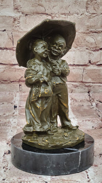 Bronze Elderly Couple Sculpture – Holding Umbrella