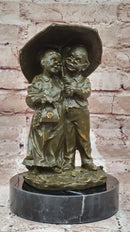 Bronze Elderly Couple Sculpture – Holding Umbrella