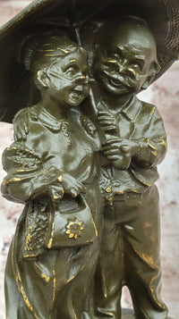 Bronze Elderly Couple Sculpture – Holding Umbrella