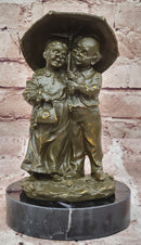 Bronze Elderly Couple Sculpture – Holding Umbrella