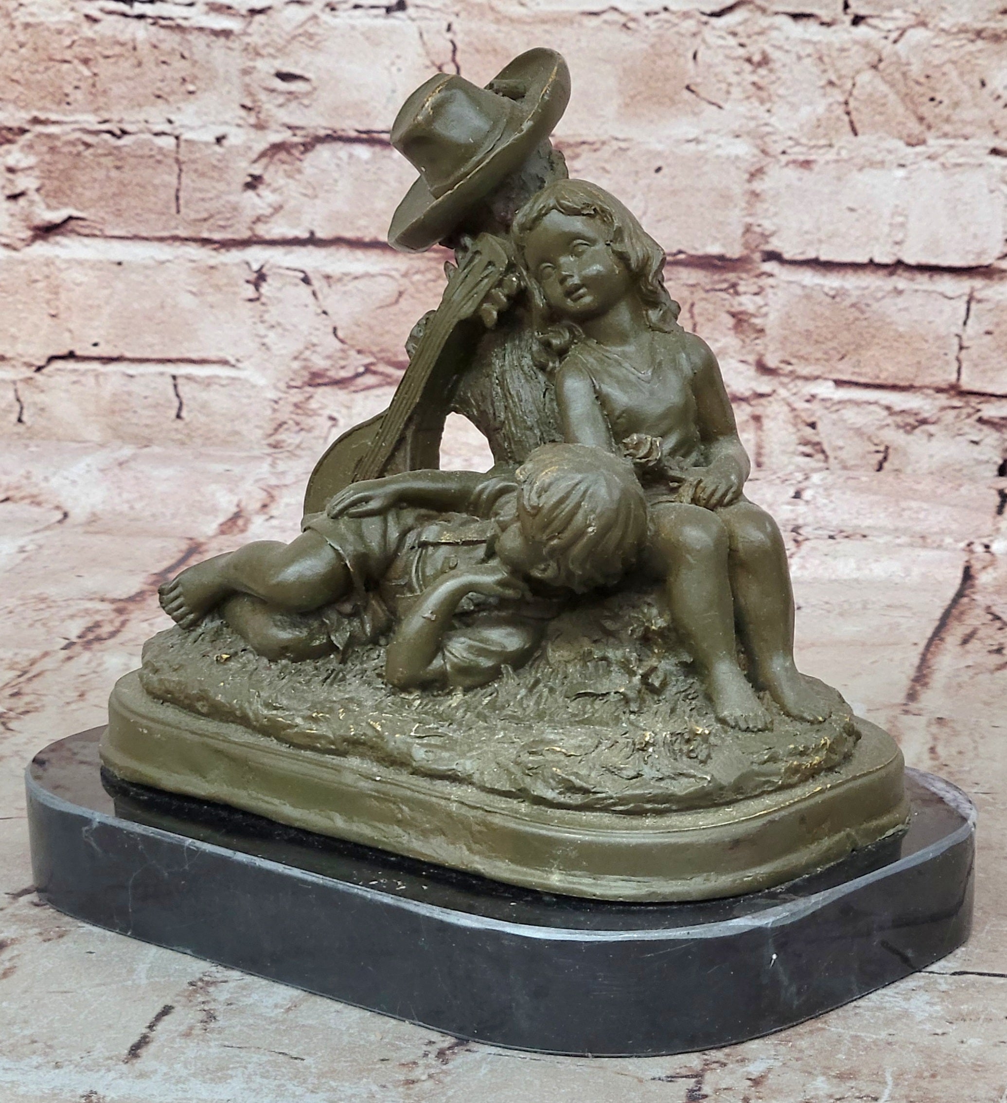 Bronze Children Resting Sculpture – Boy and Girl with Guitar