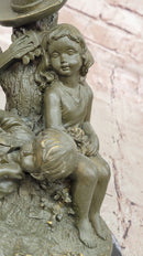 Bronze Children Resting Sculpture – Boy and Girl with Guitar