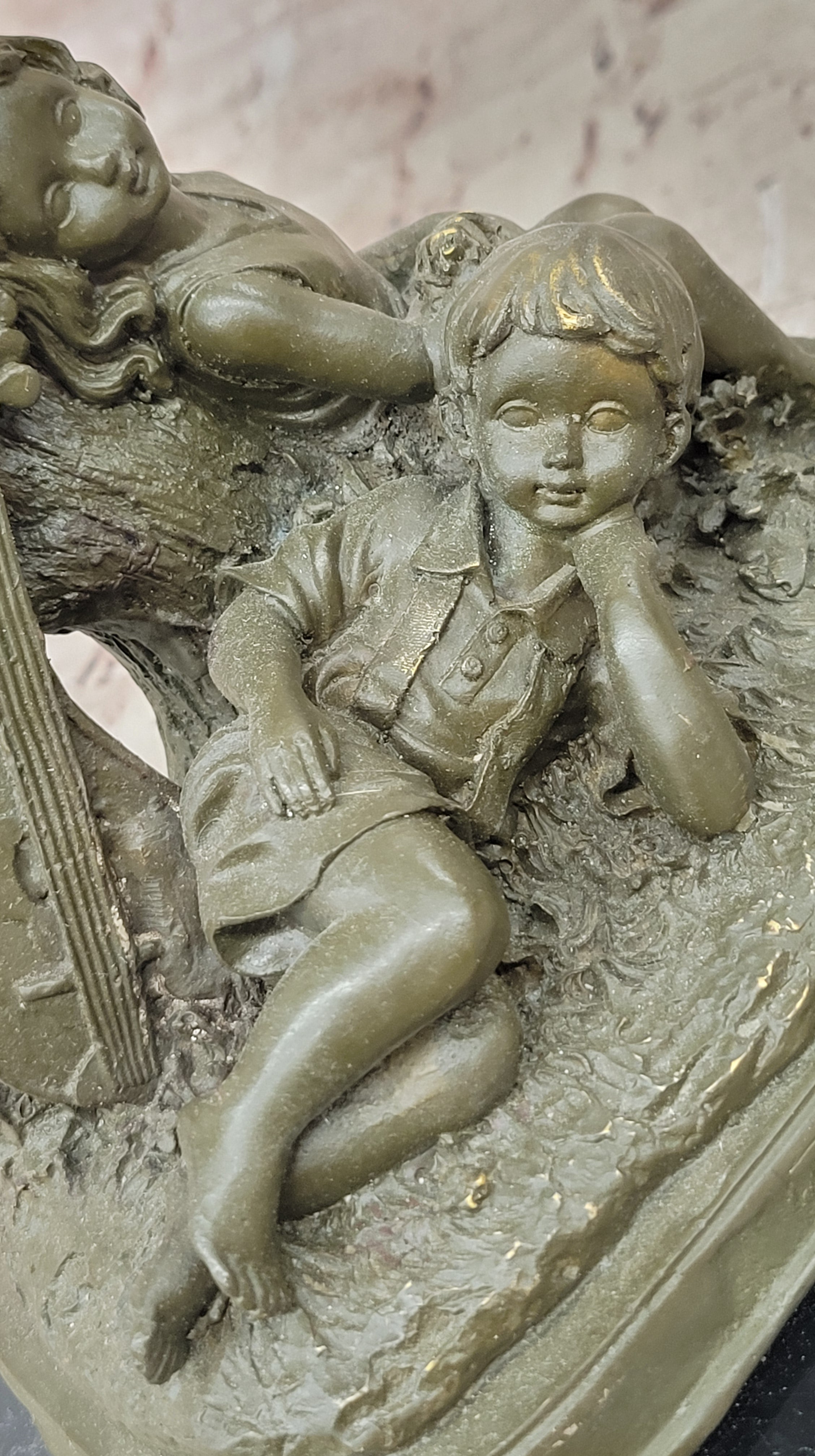 Bronze Children Resting Sculpture – Boy and Girl with Guitar