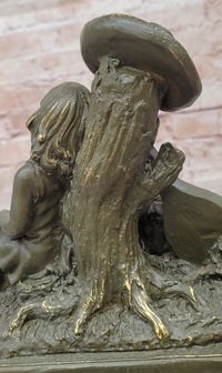 Bronze Children Resting Sculpture – Boy and Girl with Guitar