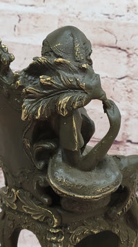 Seated Lady in Ornate Chair Bronze Sculpture