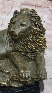 Bronze Reclining Lion Majestic Wildlife Sculpture