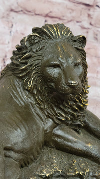 Bronze Reclining Lion Majestic Wildlife Sculpture