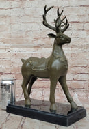 Bronze Deer with Antlers - Elegant Wildlife Sculpture