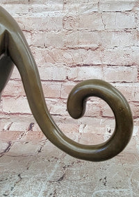 Stretching Panther Cougar in an Art Deco Style Bronze Sculpture by Henry Moore