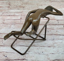 Nude Sunbathing Female Figure on Beach Chair - Bronze Sculpture by Mario nick