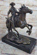 Arizona Cowboy Bronze by Frederic Remington