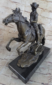 Arizona Cowboy Bronze by Frederic Remington