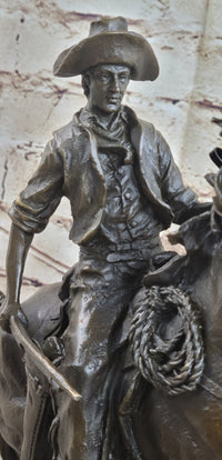 Arizona Cowboy Bronze by Frederic Remington