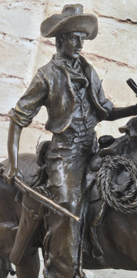 Arizona Cowboy Bronze by Frederic Remington