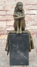 Woman Sitting on Rug Bronze Sculpture Black Marble Base