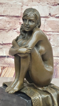 Woman Sitting on Rug Bronze Sculpture Black Marble Base