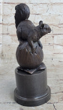 Squirrel on Acorn Bronze Metal Sculpture 9" x 4"