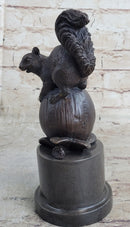 Squirrel on Acorn Bronze Metal Sculpture 9" x 4"
