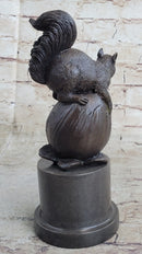 Squirrel on Acorn Bronze Metal Sculpture 9" x 4"