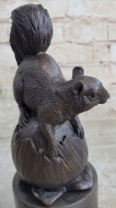 Squirrel on Acorn Bronze Metal Sculpture 9" x 4"