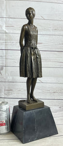 Young Woman in Dress With Short Hair Bronze Sculpture on Marble