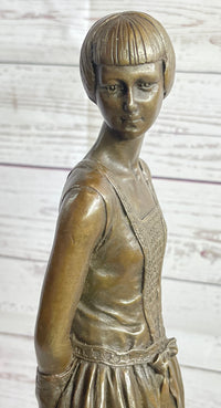 Young Woman in Dress With Short Hair Bronze Sculpture on Marble