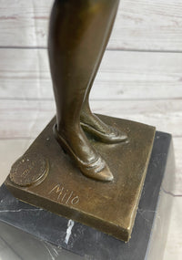 Young Woman in Dress With Short Hair Bronze Sculpture on Marble