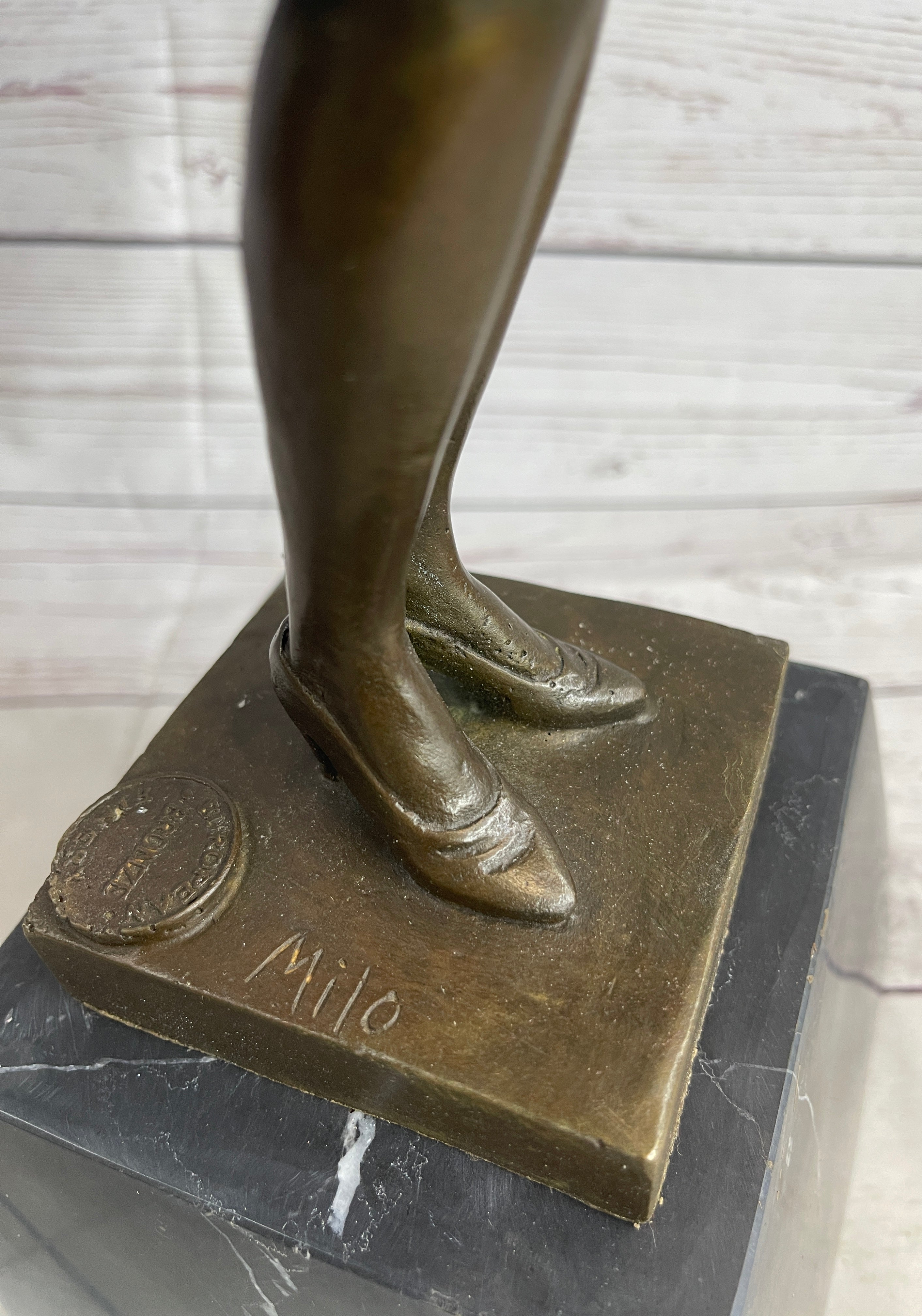 Young Woman in Dress With Short Hair Bronze Sculpture on Marble