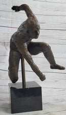 Running for the Money Bronze Metal Sculpture Statue of Man Covered in Currency Symbols 17" x 17"