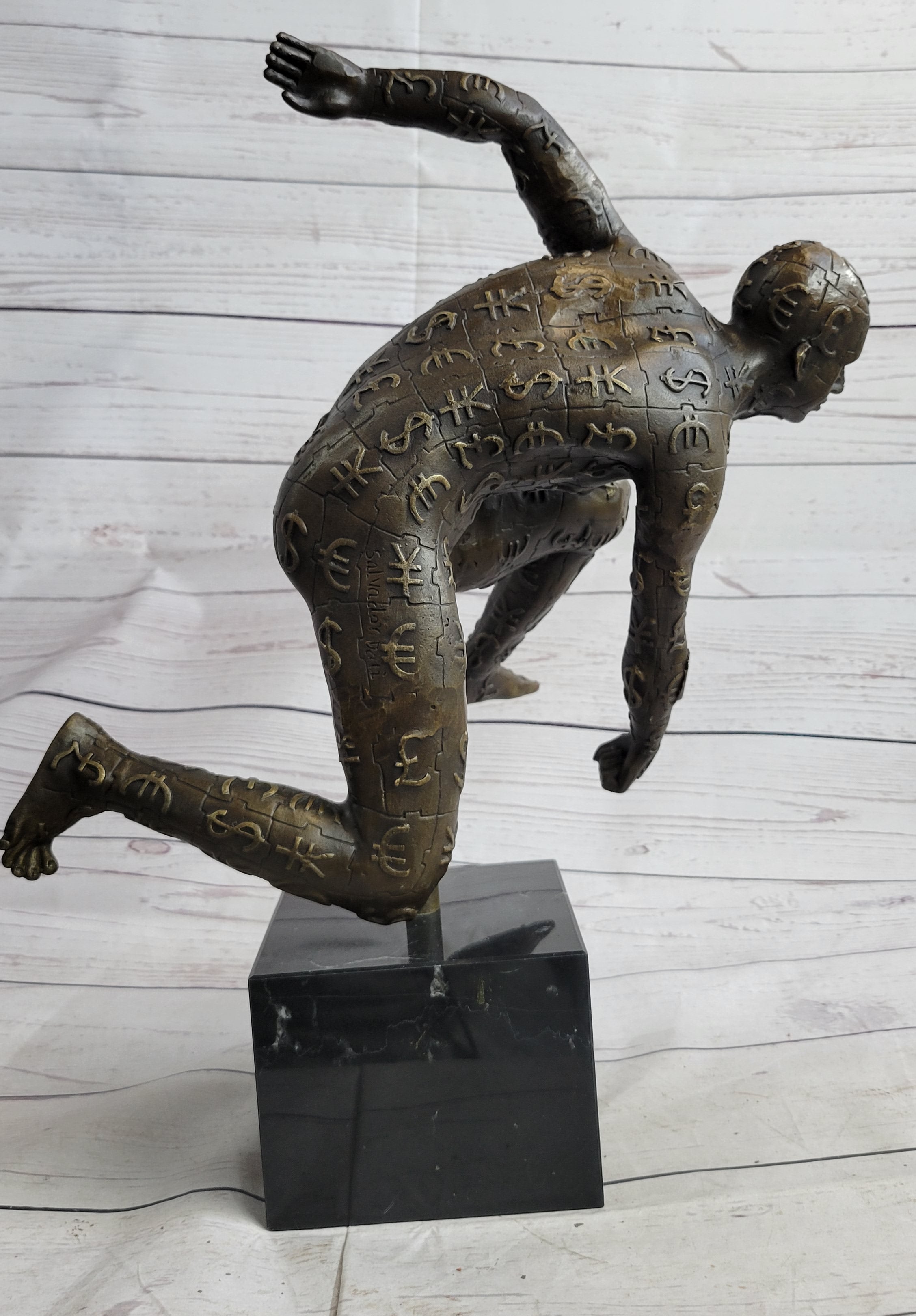 Running for the Money Bronze Metal Sculpture Statue of Man Covered in Currency Symbols 17" x 17"