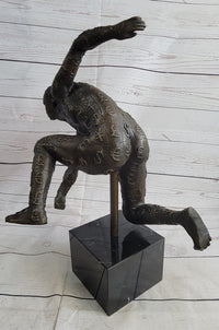 Running for the Money Bronze Metal Sculpture Statue of Man Covered in Currency Symbols 17" x 17"