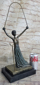 Salvador Dali Alice in Wonderland Green Patina Bronze