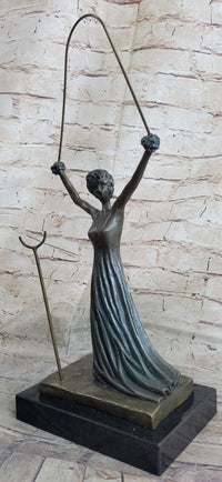 Salvador Dali Alice in Wonderland Green Patina Bronze
