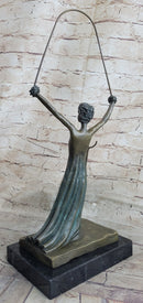 Salvador Dali Alice in Wonderland Green Patina Bronze